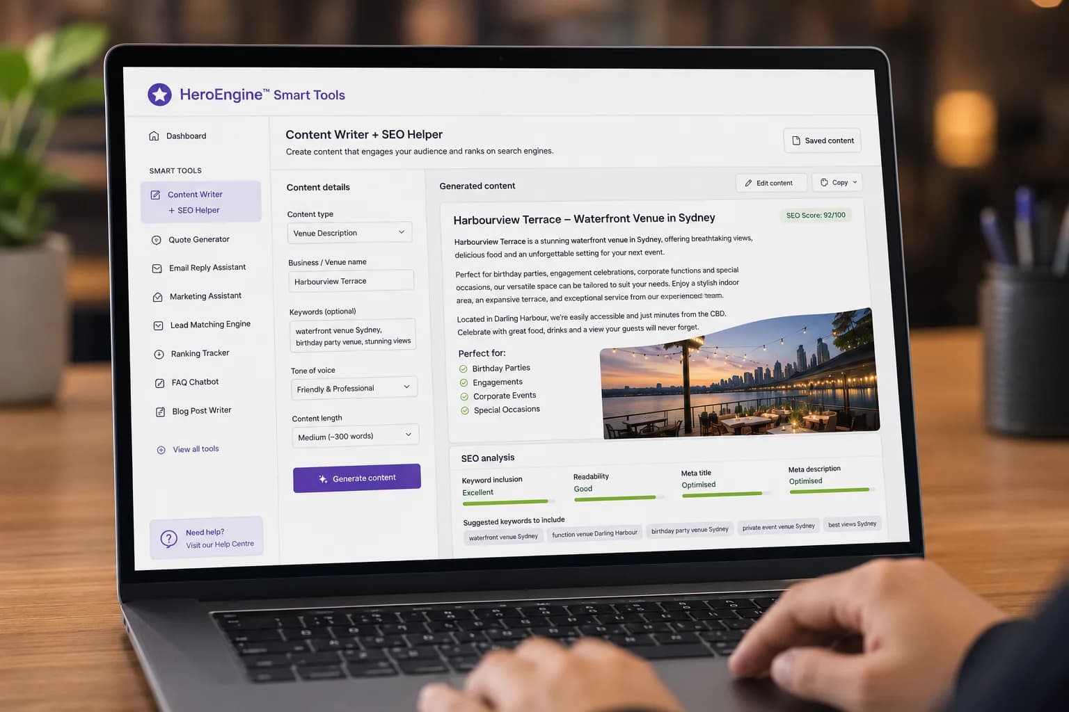 A laptop showing the HeroEngine Smart Tools dashboard generating listing content